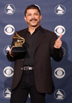 NEW YORK - FEBRUARY 23:  Winner for Best Tejano Album for "Acuerdate", Emilio Navaira poses backstage at the 45th Annual Grammy Awards Pre-Telecast at Madison Square Garden on February 23, 2003 in New York City.  (Photo by Mark Mainz/Getty Images)